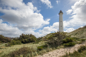 Fototapeta na wymiar Lighthouse lyngvig with dunes