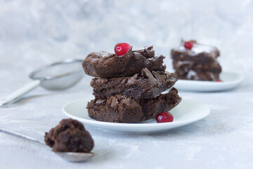 Food photo of sweet chocolate dessert. Cake on a white plate on a bright background