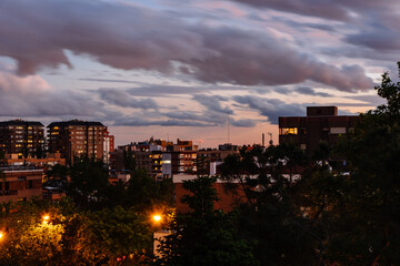Fototapeta premium Residential District in Madrid. Arturo Soria Street in Ciudad Lineal. View at sunset
