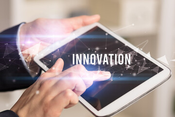 Close up hands using tablet