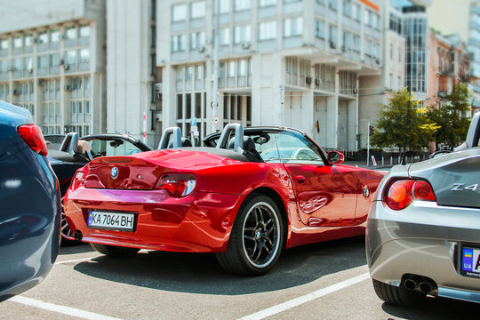 Kiev, Ukraine - May 22, 2021: Row of BMW Z4 cars in the city. Colored BMW cars in a row