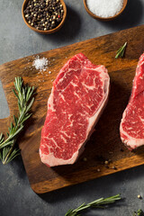 Fototapeta na wymiar Raw Red Organic New York Strip Steak