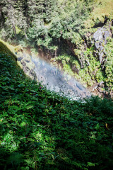 beautiful waterfall in the alpine mountains