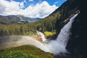 Fototapeta na wymiar beautiful waterfall in the alpine mountains