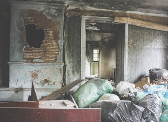 Garbage in plastic bags. Abandoned building in Pripyat. Interior of an abandoned house. Exclusion Zone