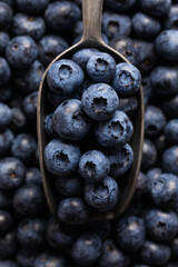 Fresh blueberries in a old spoon, macro