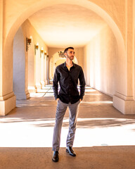 Man standing in corridor dress up