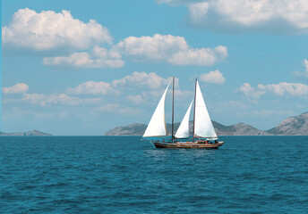 Beautiful sailboat in the Mediterranean Sea  along the greek coast.