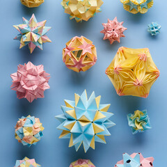 Set of multicolor handmade modular origami balls or Kusudama Isolated on blue background. Visual...