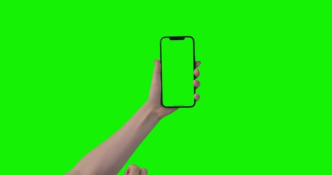 Woman with Pink Manicure using Smartphone with Green Mock-up Screen. 17 Swiping, Scrolling Gestures. Mobile iPhone 12 Pro Max Mock Up, Internet Social Networks Browsing. Point of View, POV.
