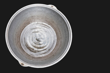 Water in a large metal container