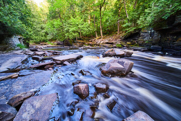 Rocks against waterfall