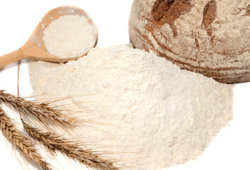 Bread, flour, spikelets of wheat on a white background. Flour is the main ingredient for baking.
