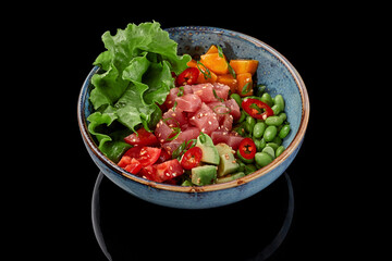 Poke bowl of tuna, mango, tomatoes, avocados, edamame beans, lettuce