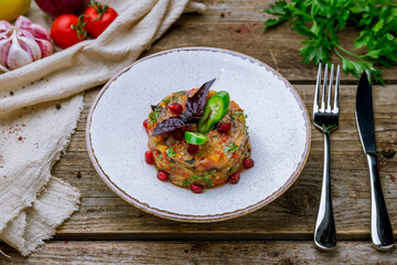 eggplant caviar on plate on old wooden table