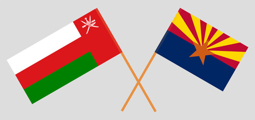 Crossed flags of Oman and the State of Arizona. Official colors. Correct proportion