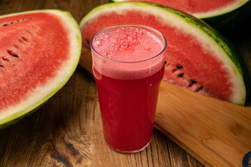 fresh watermelon on a wooden table. With watermelon
