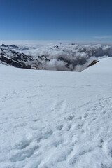 Glaciers and snow between the alps near the matterhorn and Monte Rosa, near the town of Zermatt, Switzerland - June 2021