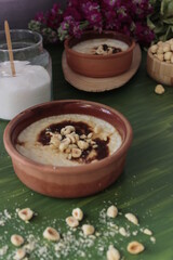 A bowl of sutlac, a turkish milk dessert, on a table