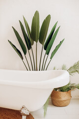 Bali style bathroom with palm branches