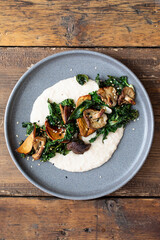 White bean puree with crispy kale and mushrooms