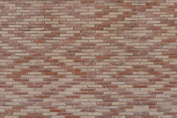 Brick wall with diamond pattern. Orange and red brick wall background. Old red brick texture background. Material for 3D models.