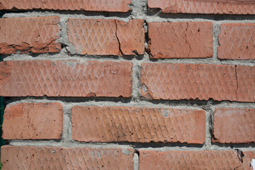 Brick red wall full frame close-up