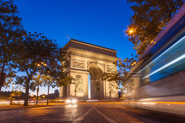 Fototapeta na wymiar Night view of Arc de Triomphe - Triumphal Arc in Paris, France