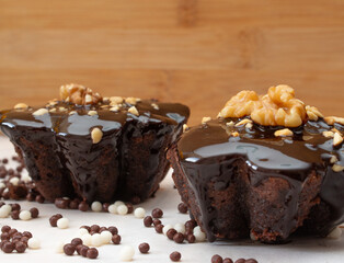 delicious chocolate candie with nuts  on the top under the white table