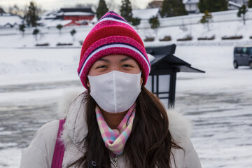 Lady travel in Sapporo city, Hokkaido, Japan during winter season