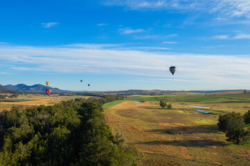 Hot air balloons rising in the air at the Hunter Valley, Australia