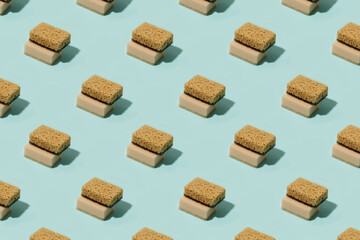 Seamless Pattern with neutral beige clean sponges for home cleaning on blue background. Banner for your site, concept for laundry, cleaning service, advertising, spring regular cleaning day