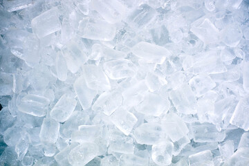 Lots of white ice cubes, stacked on top of each other to be used for organizing the party, background, macro