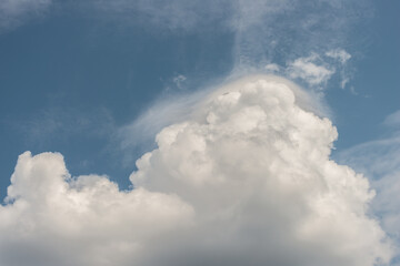 big fluffy clouds on a summer's day - background