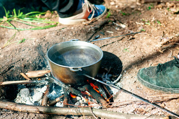 cauldron on campfire