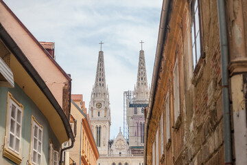 Fototapeta na wymiar Zagrebacka Katedrala, also known as Zagreb cathedral, seen in the afternoon from Kaptol district. This is the biggest catholic church of Croatia and a major landmark of the croatian capital city. ..