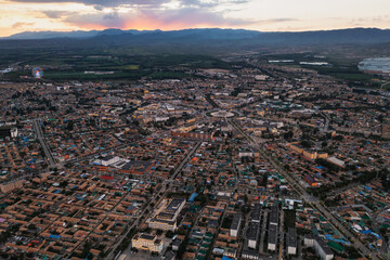 Fototapeta na wymiar The cityscape of Turks Bagua City in China at dusk.