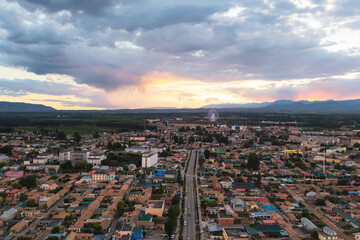 The cityscape of Turks Bagua City in China at dusk.