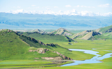 Winding rivers and meadows. Photo in Bayinbuluke Grassland in Xinjiang, China.