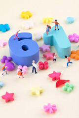 Fototapeta premium Miniature creative children's day cheerful children and number 61