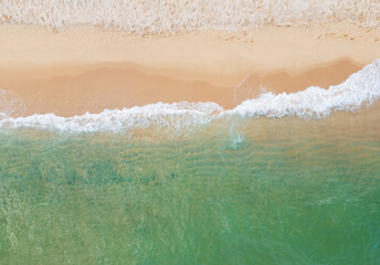 Fototapeta na wymiar A ocean waves and beach top view, natural background.