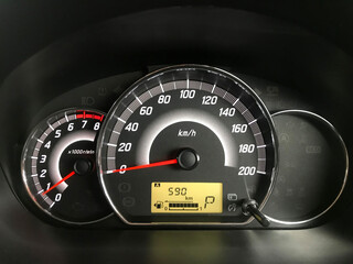 Dashboard showing status in the car and fuel level Concept Oil is on sale. Hurry up to fill it up.