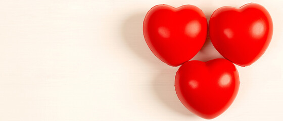 red foam plastic heart on white background and heart health care