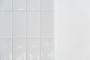 white ceramic tile and cement wall background.