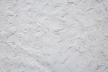 Gray concrete wall texture. Grunge cement wall, material. Modern pattern for decorative design. Grey backdrop. Interior and exterior elements. Abstract background. Concrete uneven rough floor.