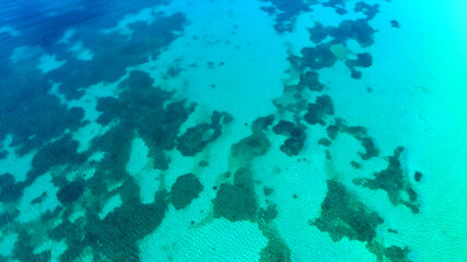 Fototapeta na wymiar Top view of blue transparent ocean