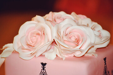 Pink Wedding Cake Decorated with White  Roses Flowers 