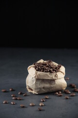 Coffee Beans on dark background in bag