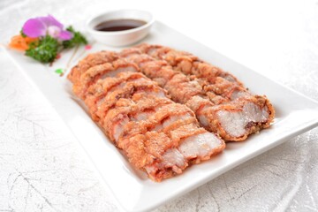 deep fried bbq crispy fragrant fat pork belly meat with chef sweet dark soy sauce in white background asian banquet menu