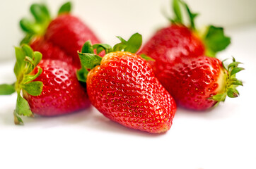 Strawberries on a white background.